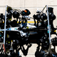 F1 pit stop from above, during a race.